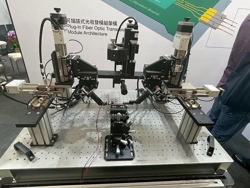 Industrial automated active alignment system for CPO co‑packaged optics mass manufacturing