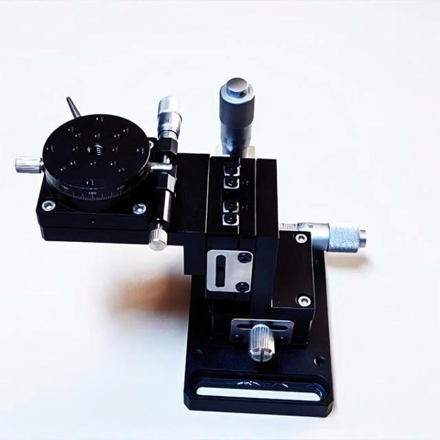 Manual 6‑DOF multi‑axis displacement stage for laser diode packaging